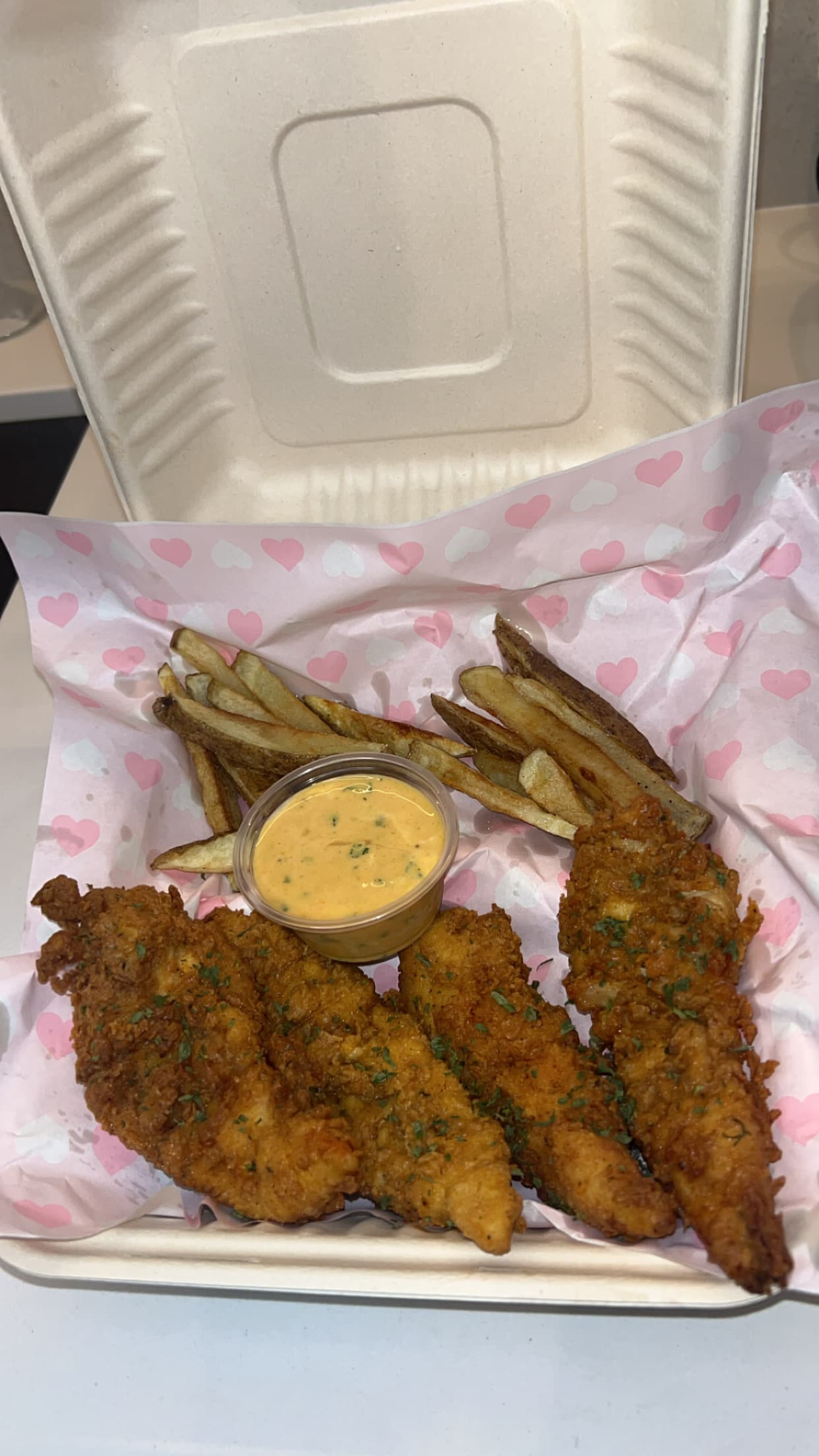 Golden fried chicken tenders with fries—soul food catering favorite for buffets and receptions