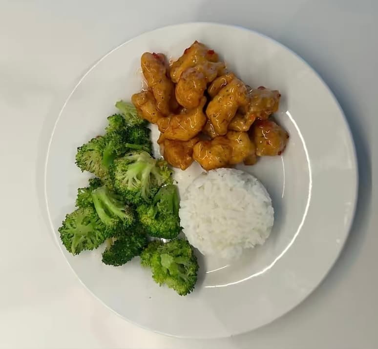Orange chicken dinner—Asian-inspired plate for corporate and private party catering